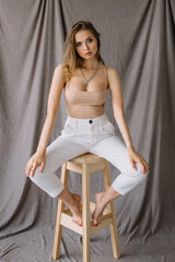 Cute woman sitting on a chair