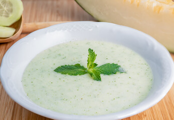 Melon soup with cucumber and mint.