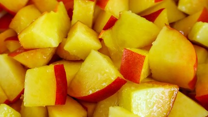 Background texture bright yellow cut fruit peach close-up