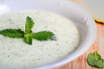 Melon soup with cucumber and mint.