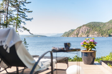 Sun lounger by a fjord in Norway