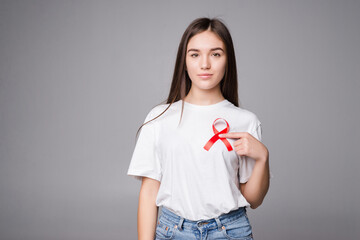 Red ribbon breast cancer of a woman isolated on gray background