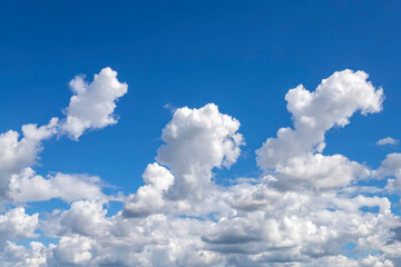 Naklejka na ściany i meble Blue sky with white clouds in sunny day.