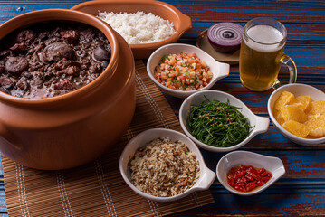 Typical Brazilian dish called Feijoada. Made with black beans, pork and sausage.