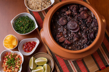 Typical Brazilian dish called Feijoada. Made with black beans, pork and sausage.