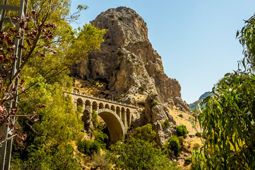 A view of the railway bridge close to the entrance to the Gaitanejo river gorge near Ardales, Spain...