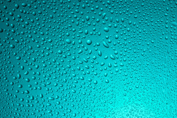 Close-up of water drops on glass . Abstract background texture.