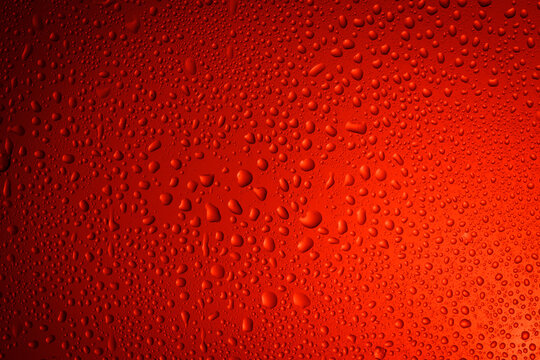 Close-up of water drops on glass . Abstract background texture.