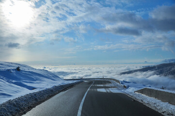 Transalpina Road above the clouds. Winter