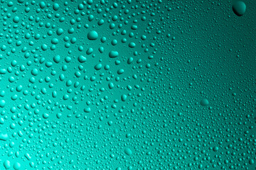 Close-up of water drops on glass . Abstract background texture.