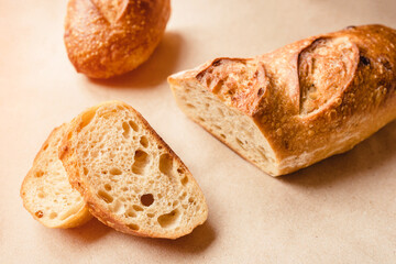 Fresh sliced bread on kraft paper. Close up.