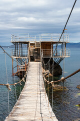 Fototapeta premium Abandoned rusty pier on the sea