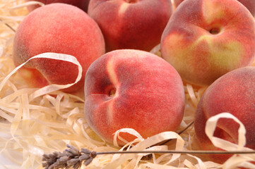 Beautiful juicy peach on a light background