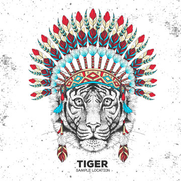 Hipster animal tiger with indian feather headdress. Hand drawing Muzzle of animal tiger