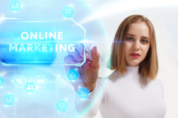 Business, Technology, Internet and network concept. Young businessman working on a virtual screen of the future and sees the inscription: Online marketing