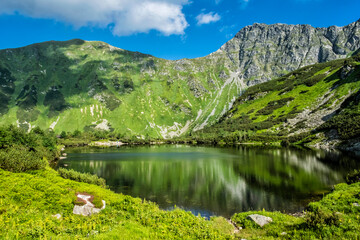 Fototapeta na wymiar Rohac tarn, Western Tatras, Slovakia, hiking theme