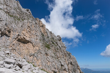 Fototapeta na wymiar rocky ridge in the mountain area of the gran sasso d'italia with a view of the marine coast of teramo