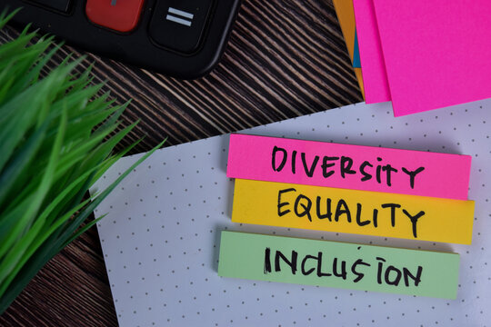 Diversity Equality Inclusion Write On A Sticky Note Isolated On Office Desk.