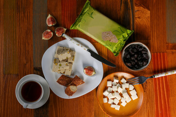 breakfast with halva, olives, cheese, bagels