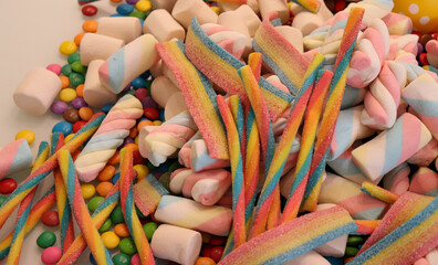 Different sweets decorating a beautiful party table.