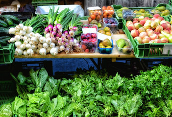 Outdoor Farmers Market with fruits and vegetables.