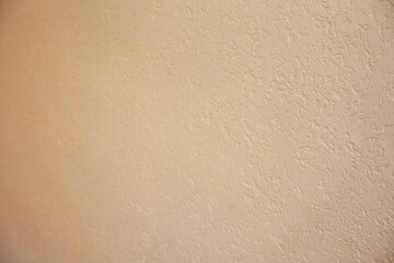 Blurred light cream background with fine structure