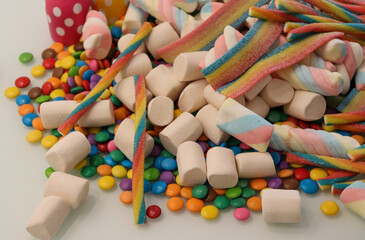 Different sweets decorating a beautiful party table.