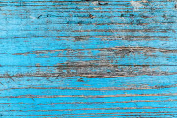 Obraz premium Texture of an old blue wooden board. Rough surface. Background