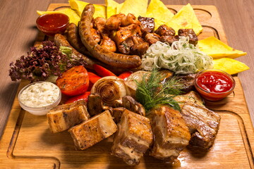 Large grill set on a wooden board