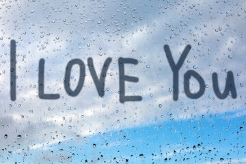 Writing i love you on steamy window. Valentine's day background