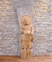 interior with buddha on the background of masonry, background for meditation