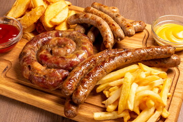 Set of grilled sausages a wooden board hunting sausages, pork sausages