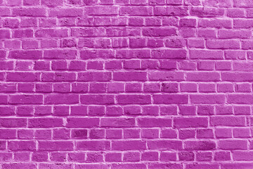 Fototapeta na wymiar The background of the old pink brick wall for design interior