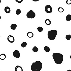 Doodle circles seamless pattern. Black dots texture background.