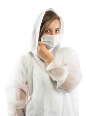 Confident doctor in protective wear and face mask wearing gloves
