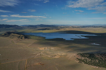 Fototapeta na wymiar Lake from hot air balloon. Colorado balloon ride showcases fourteeners and vast landscapes