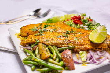 A view of a grilled fish plate.