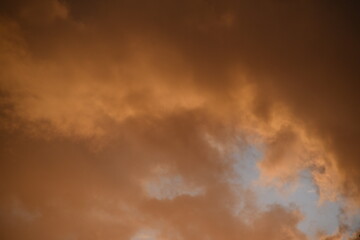 Fototapeta na wymiar Thick dark clouds in the sunlight