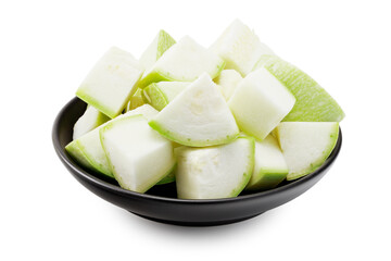 slices of zucchiniin a black plate isolated on white background