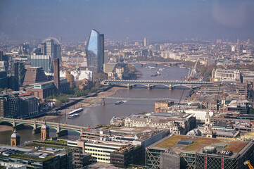 An aerial view of London, UK along the River Thames.