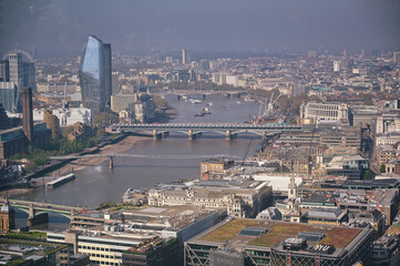 An aerial view of London, UK along the River Thames.