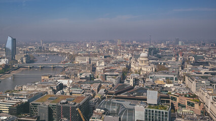 Obraz premium An aerial view of London, UK along the River Thames.