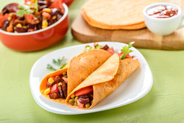 Tacos - delicious tortillas with meat and vegetables