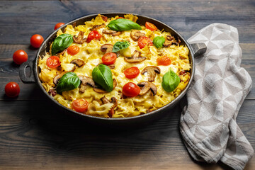 casserole  pasta with mushrooms, sausage and cheese