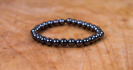 Bead bracelet on the wooden table