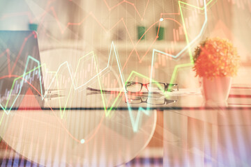 Double exposure of financial graph drawing and office interior background. Concept of stock market.
