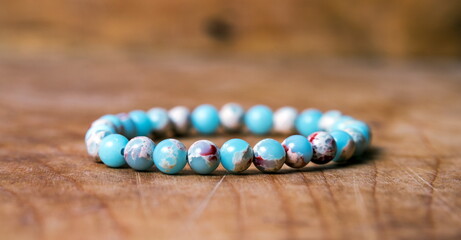 Bead bracelet on the wooden table
