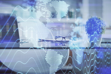 Double exposure of financial graph drawing and office interior background. Concept of stock market.