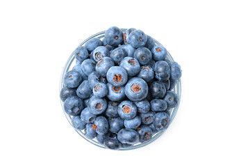 Close up of bowl full of blueberries isolated on white background. Ripe blueberry plate. Organic and healthy food.
