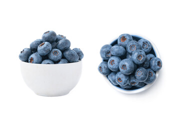 Different angles of bowl full of blueberries isolated on white background. Ripe blueberry plate. Organic and healthy food.